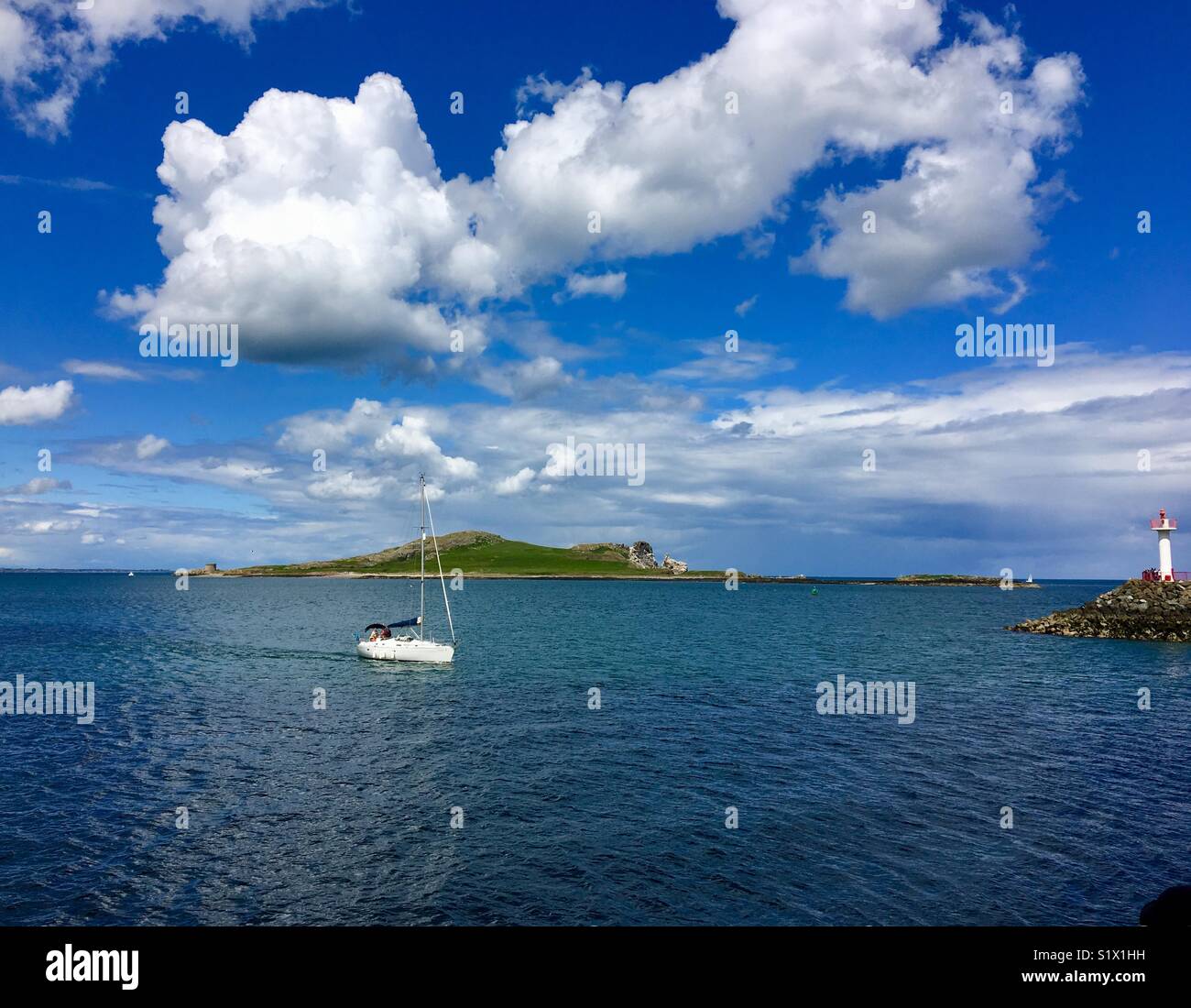 Sailing....takes me away... Sailboat entering Howth Harbor from Ireland