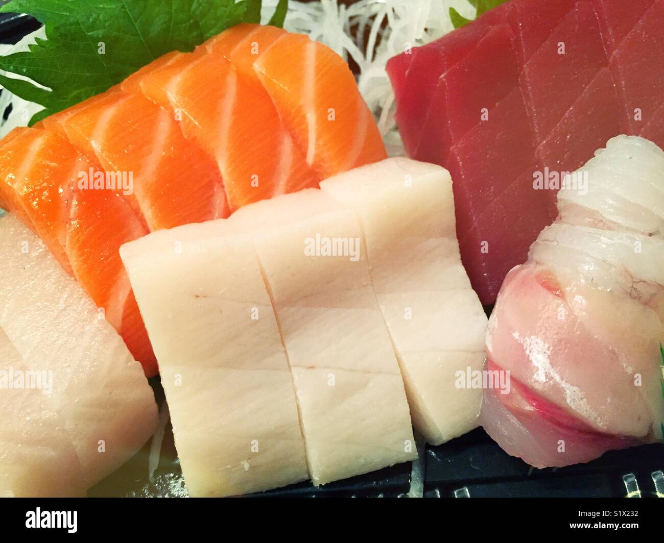 Fresh pieces of sashimi close up. - Smartphone Captured Stock Image