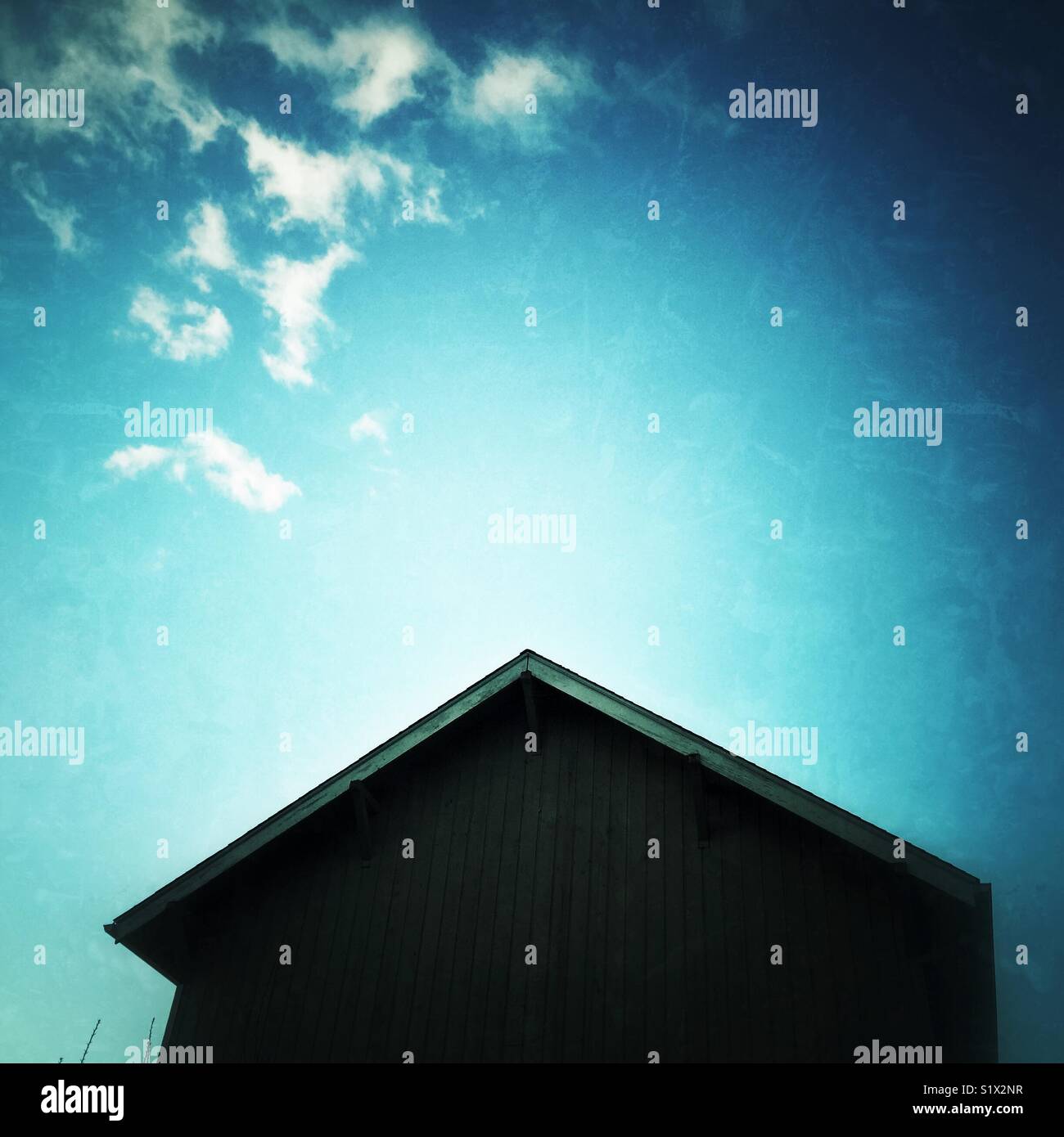 Sky with white clouds above the house -peace on Earth - Smartphone Captured Stock Image