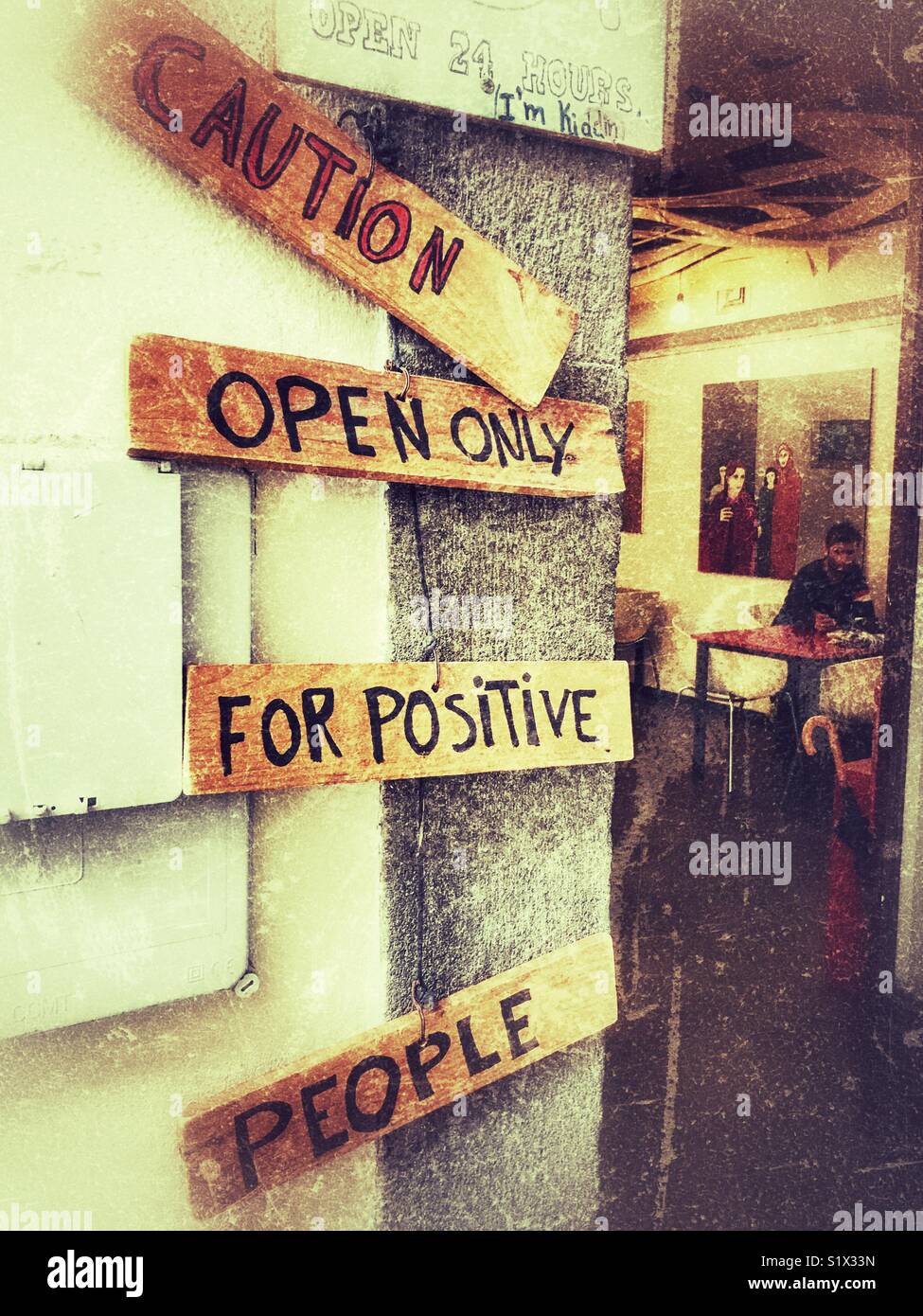 Sign outside a restaurant, caution, open only, for positive, people, Funchal, Madeira, Portugal - Smartphone Captured Stock Image