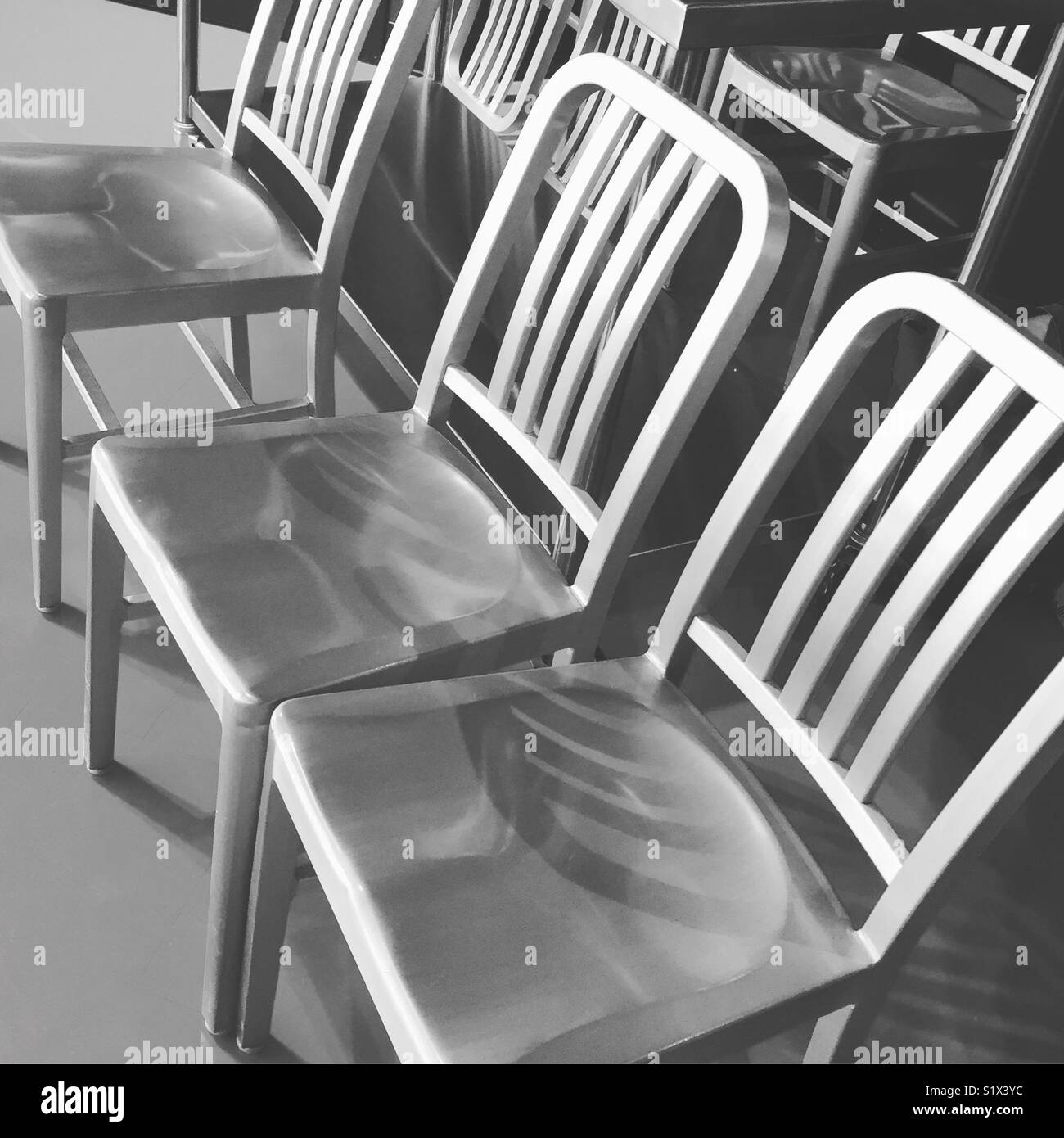 Empty metal chairs by K.R Stock Photo Alamy