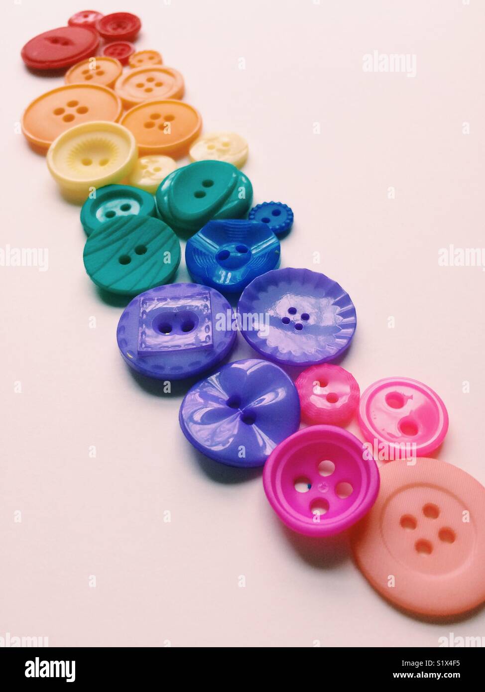 Buttons arranged in rainbow order - Smartphone Captured Stock Image