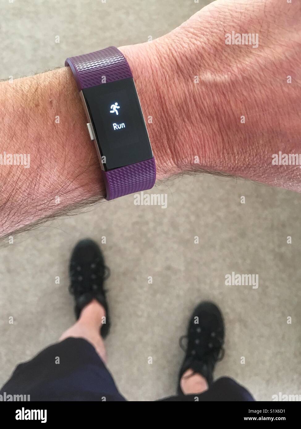 Fitbit set for a run Stock Photo