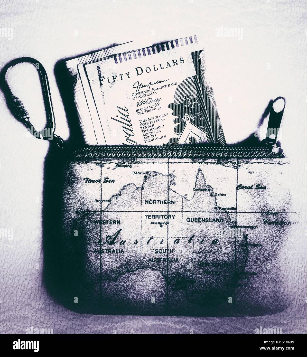 Purse with a map of Australia, containing Australian dollars - Smartphone Captured Stock Image