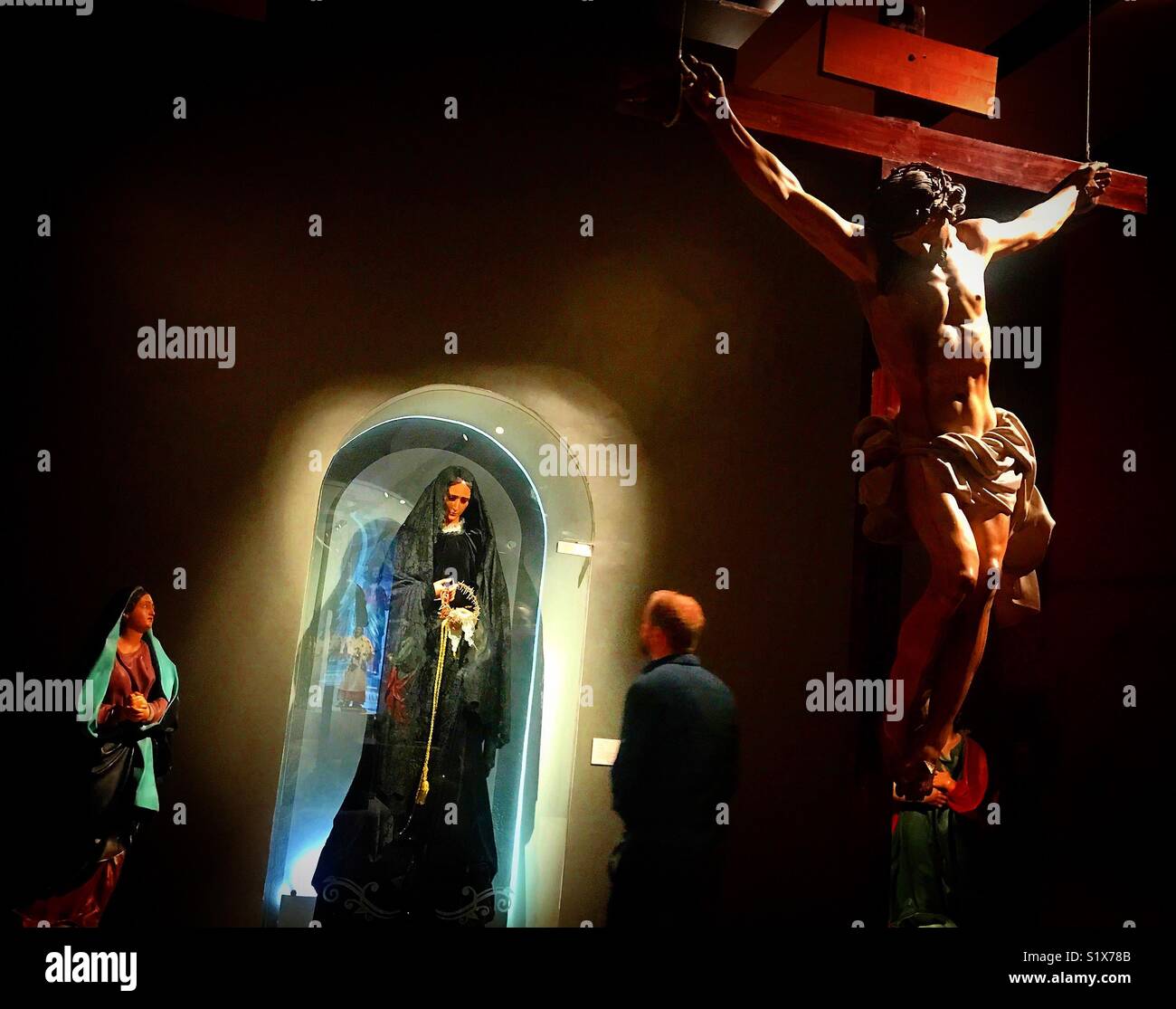A man visits the Galeria Tesoros de la Catedral museum in Puebla de los Angeles, Mexico - Smartphone Captured Stock Image