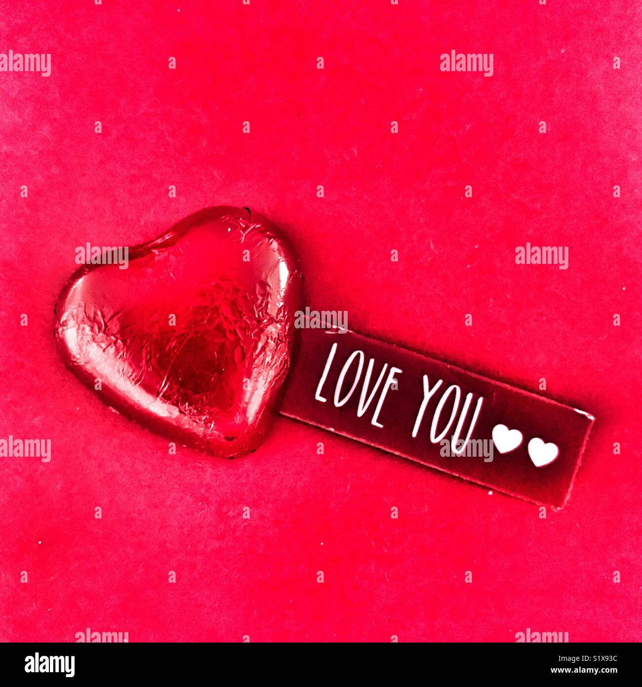 Heart shaped chocolate and Love You message. - Smartphone Captured Stock Image
