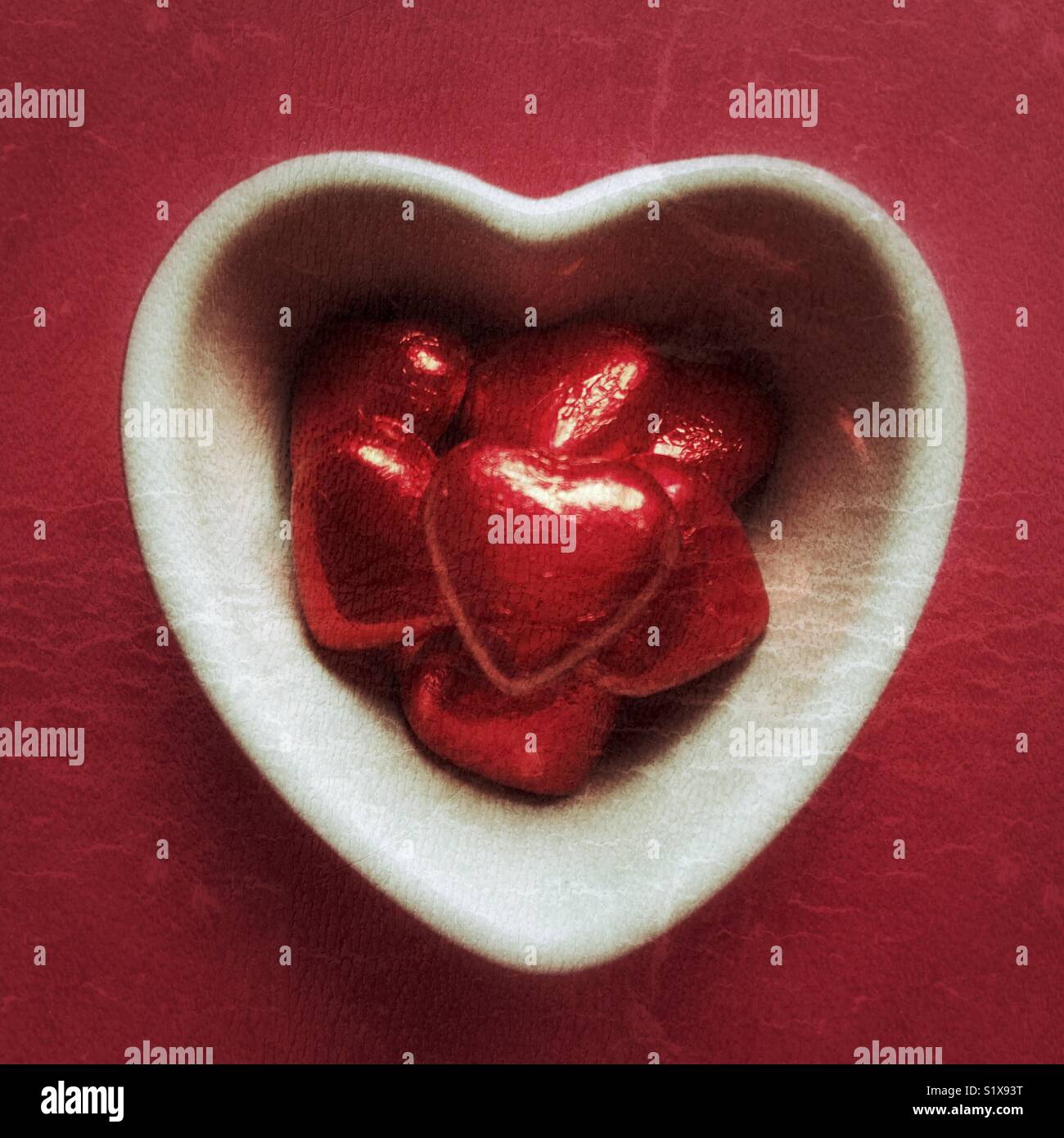 Chocolate hearts in a heart shaped dish - Smartphone Captured Stock Image
