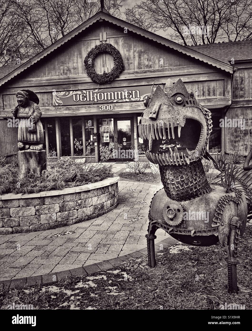 Chamber of Commerce with troll carving and metal sculpture, Mount Horeb, WI - Smartphone Captured Stock Image