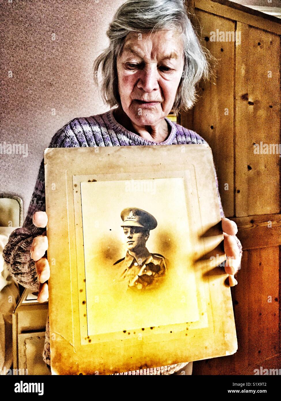 Photograph of William “Tiny” Kentish of the British Army taken in 1918 with his daughter Jean Brown taken in 2018. - Smartphone Captured Stock Image