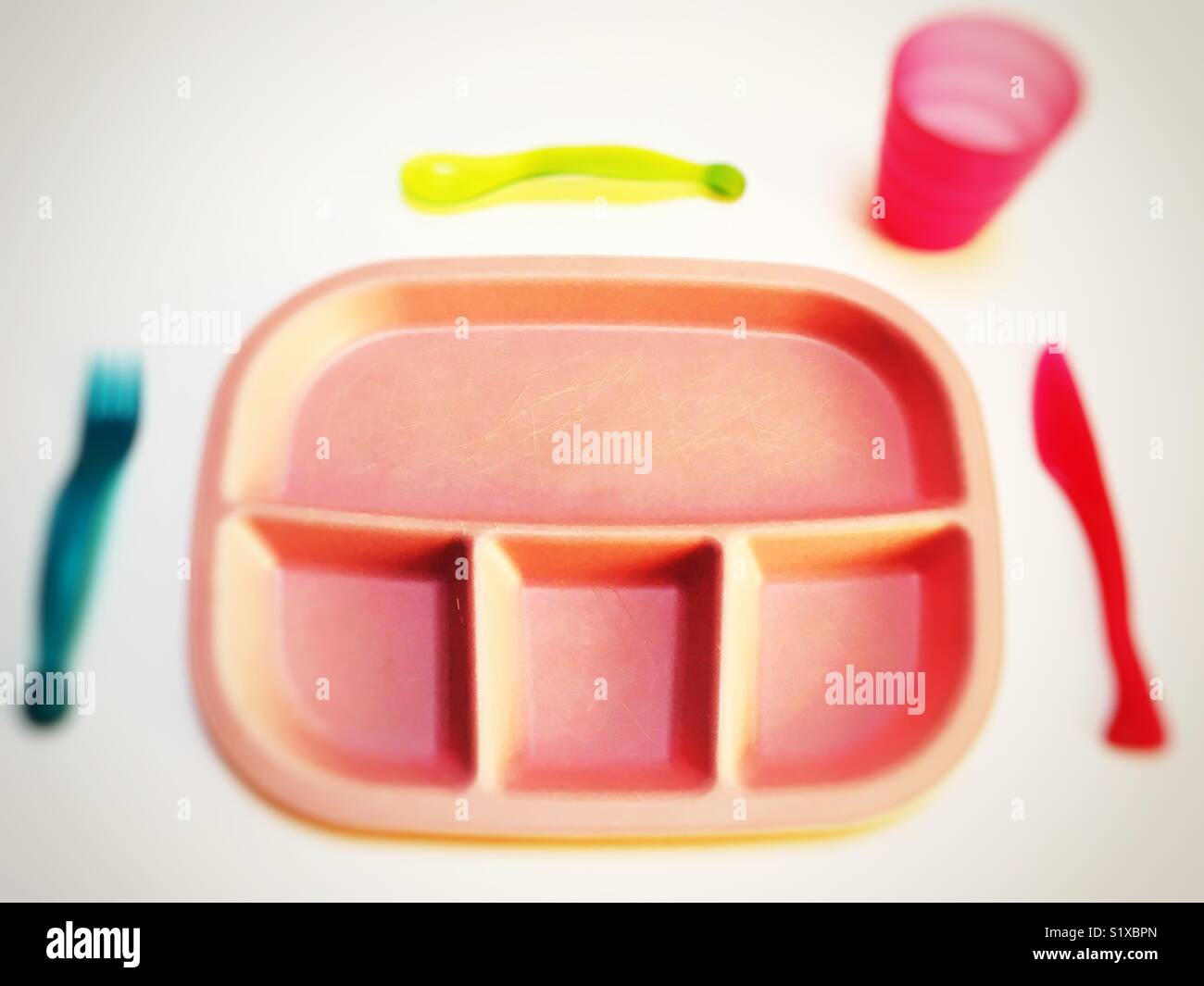 Children’s Plastic plate, cup, and cutlery Stock Photo Alamy