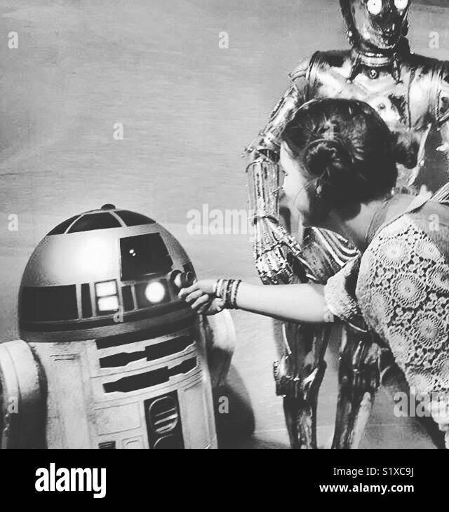 Star Wars and a wannabe Princess Leia Stock Photo