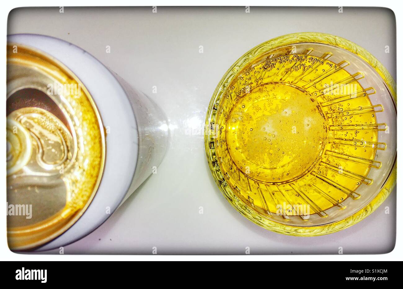 Tin and glass of beer - Smartphone Captured Stock Image