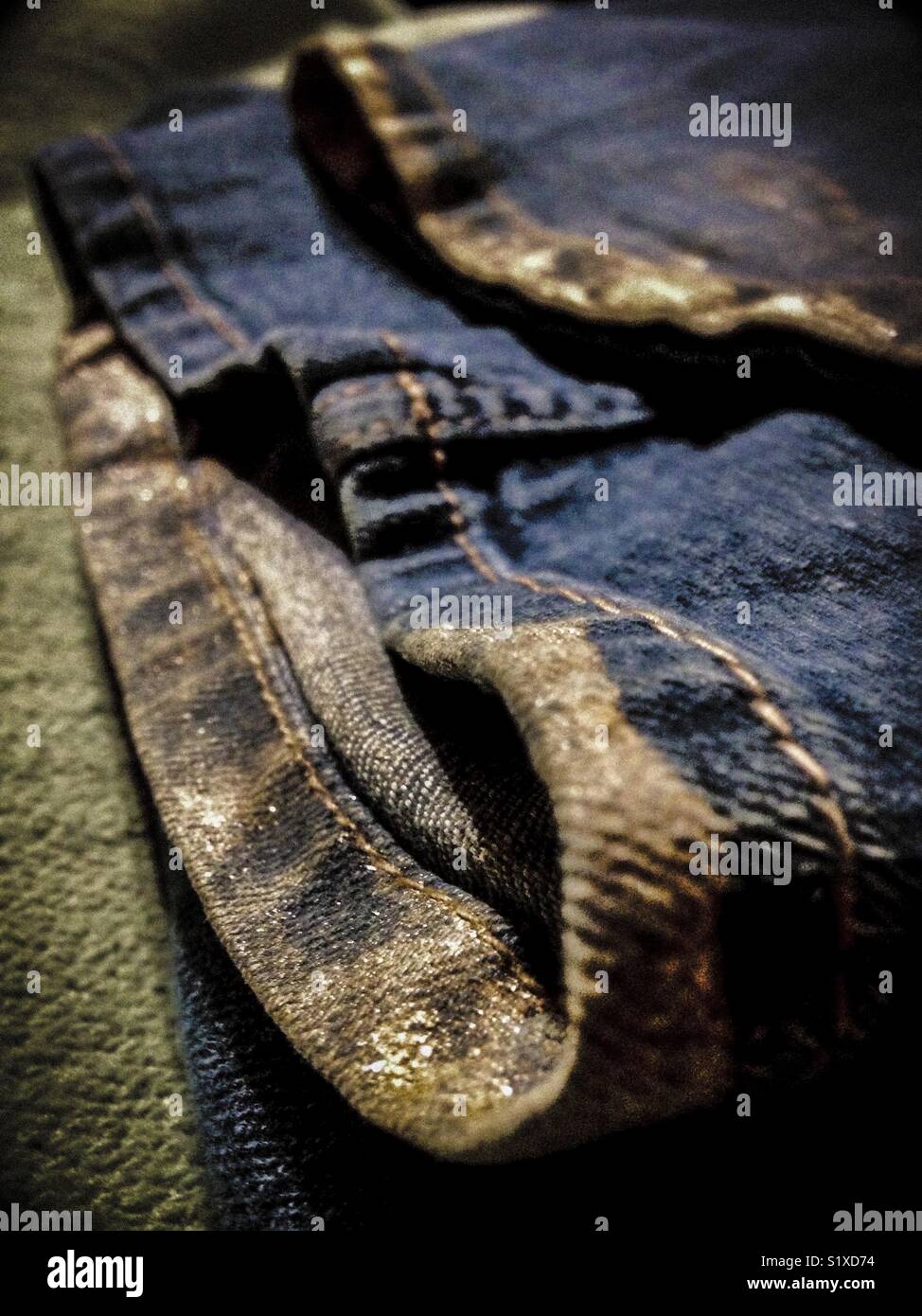 Shimmer of mica on muddy hem - Smartphone Captured Stock Image