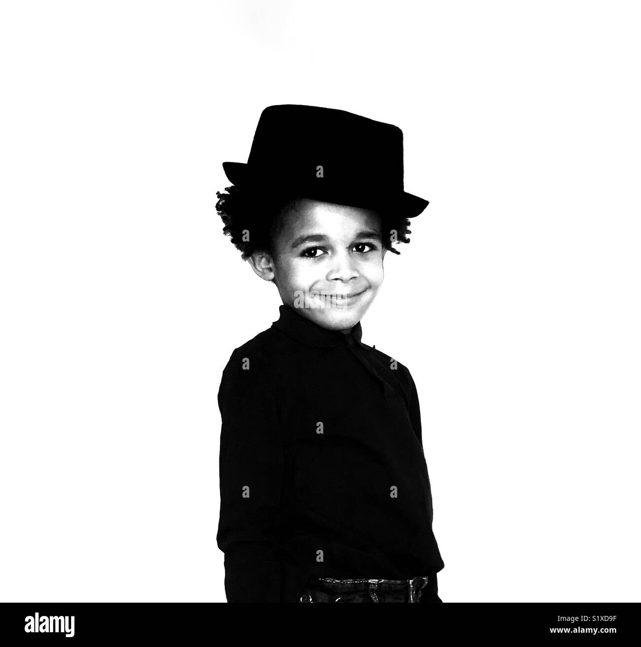 A cheeky boy in a hat. - Smartphone Captured Stock Image