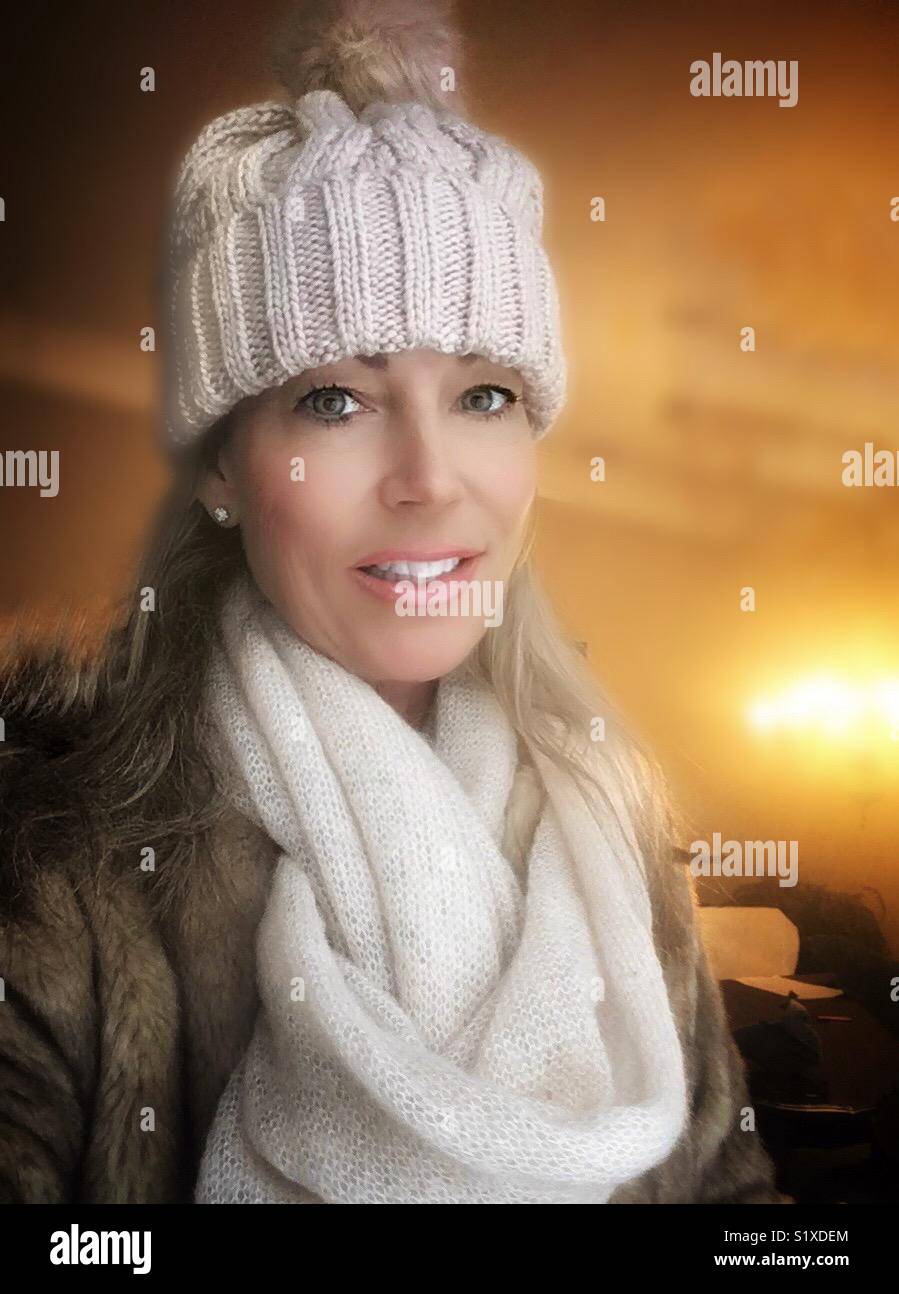 Woman with winter hat and scarf Stock Photo
