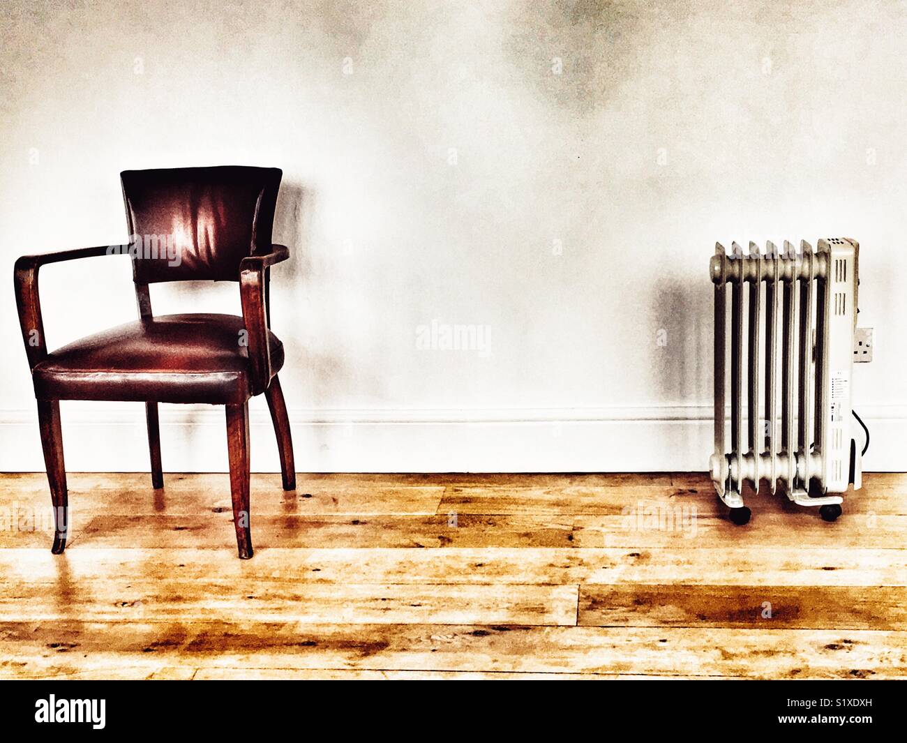 Leather Chair Electric Heater Stock Photo 310982969 Alamy