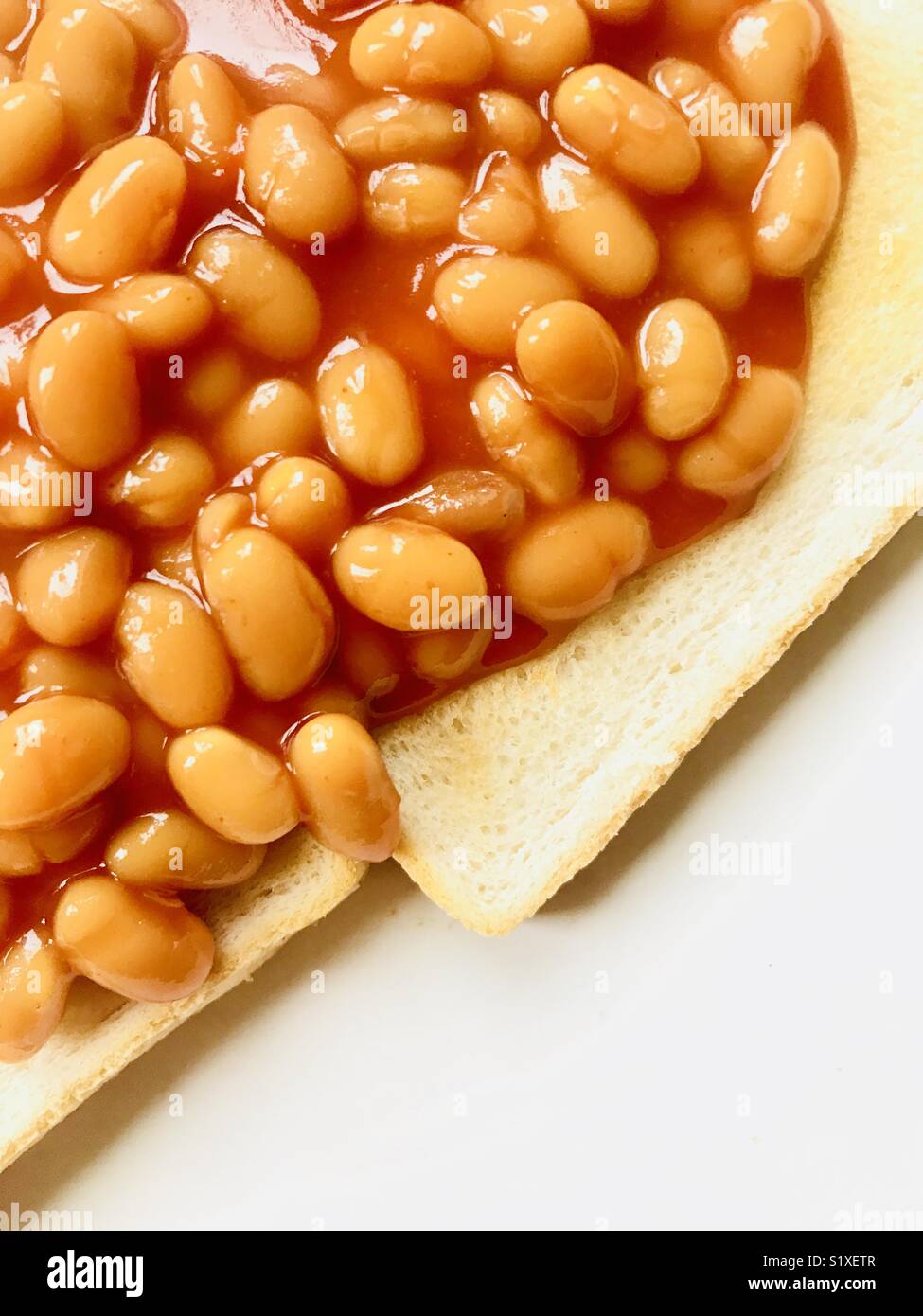Baked beans on toast Stock Photo Alamy
