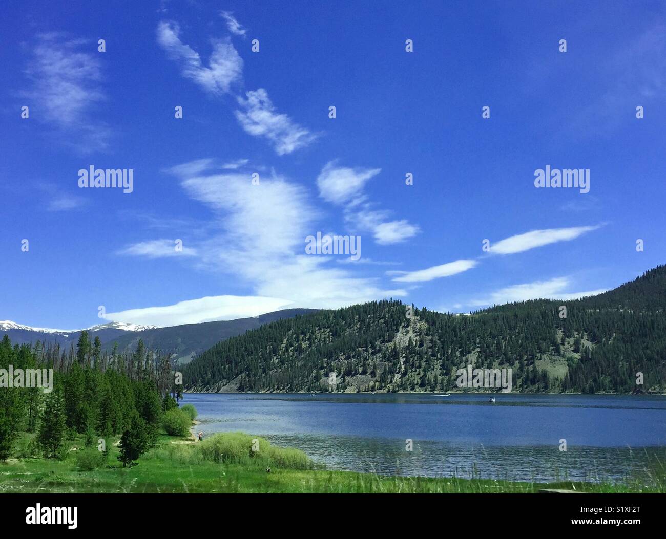 Fishing in high mountain reservoir Lake Dillon in Colorado in summer