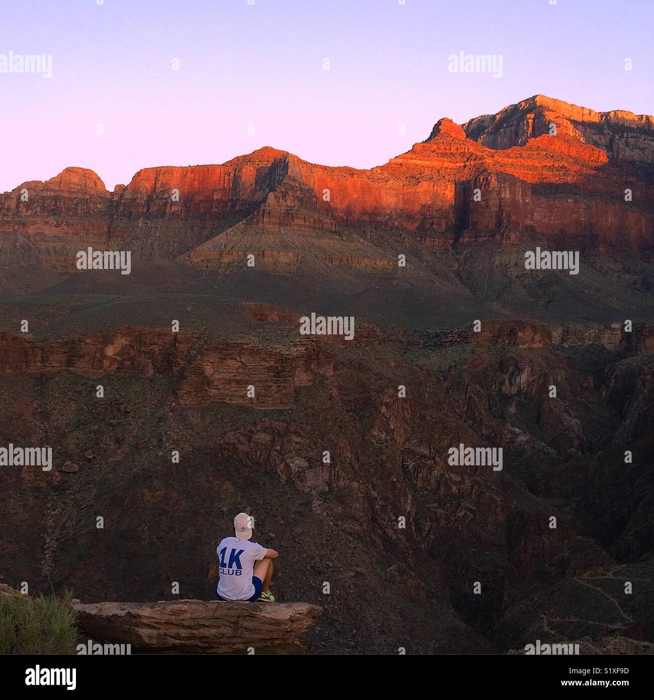 Whatching the last bit of sunlight fade off of the South Rim of the Grand Canyon Stock Photo
