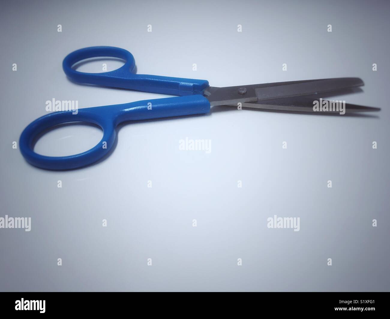 Scissors on white background. - Smartphone Captured Stock Image