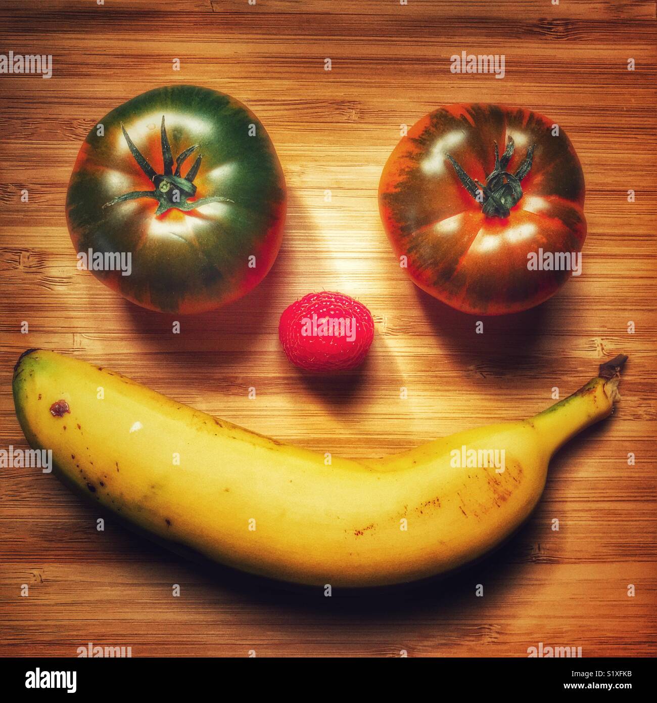Fruit face, smiling, concept of healthy eating Stock Photo