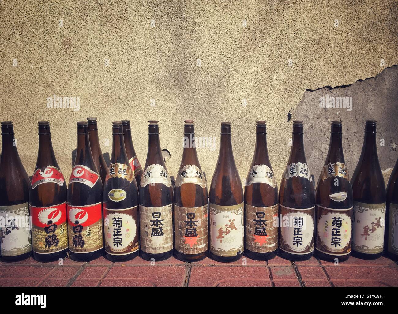 Sake empty bottles outside of a Japanese restaurant Stock Photo Alamy