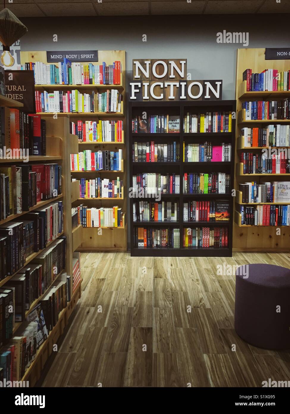 Bookstore with sign Non Fiction above bookcases Stock Photo