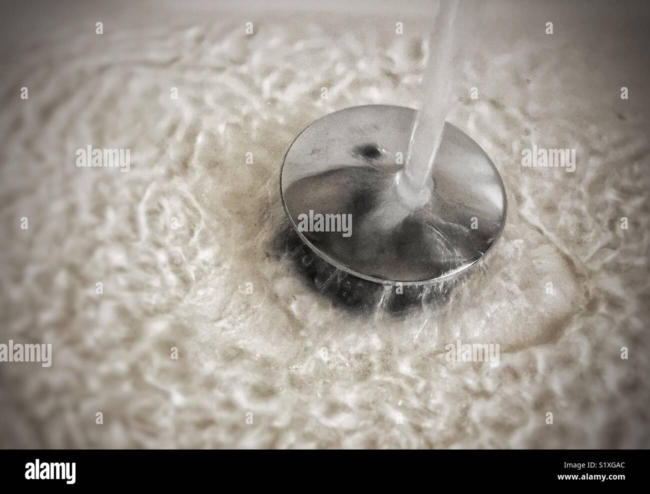 Water running in sink Stock Photo Alamy