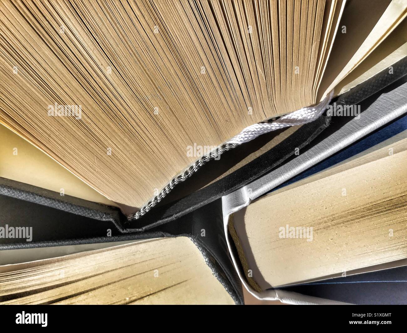 Education, hardback books - Smartphone Captured Stock Image