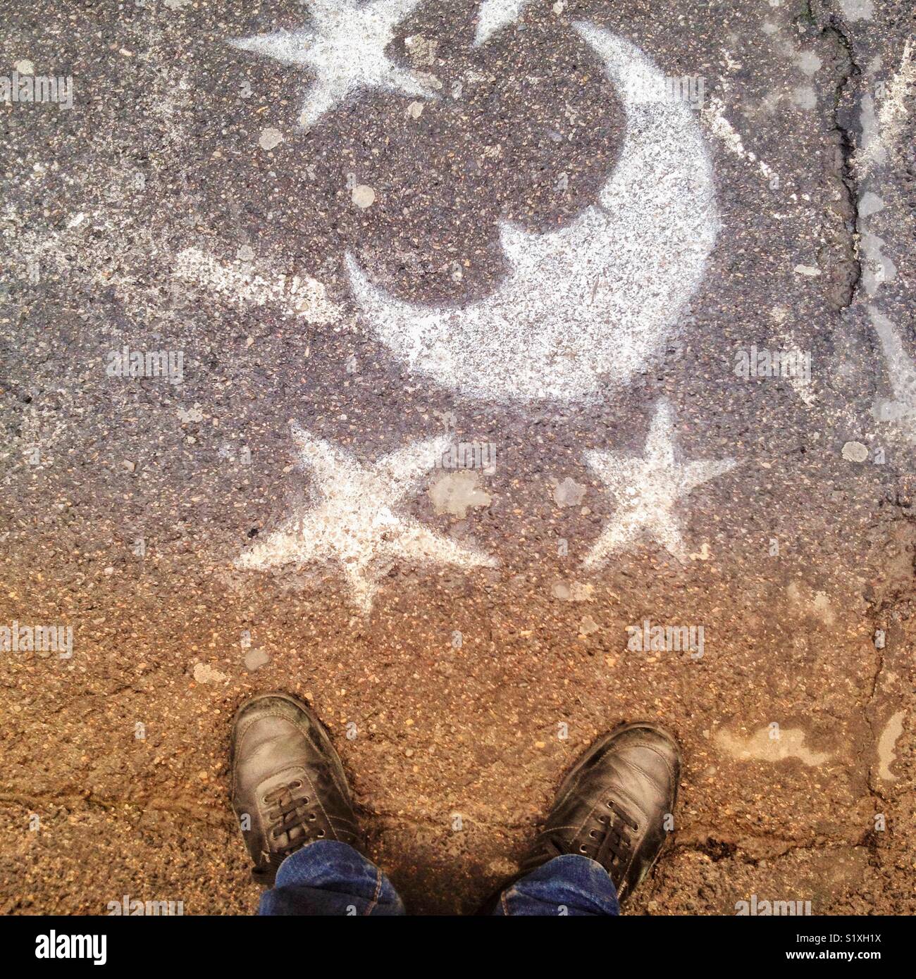 Pictograms on the floor in a street, Montpellier France - Smartphone Captured Stock Image