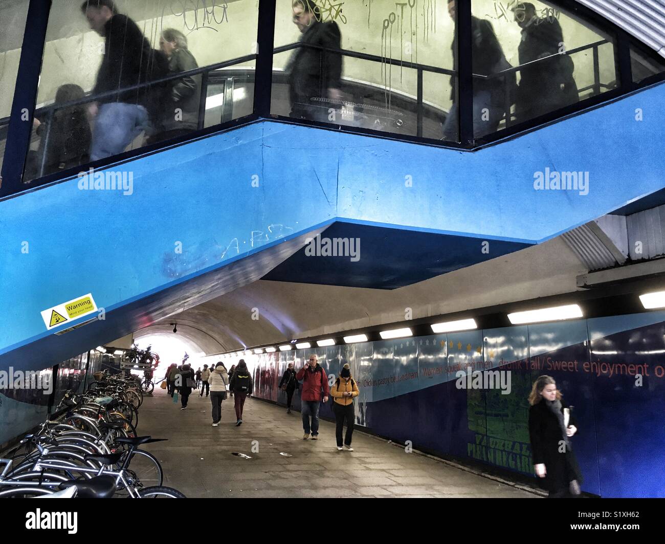 Passengers commuting in Vauxhall, England - Smartphone Captured Stock Image