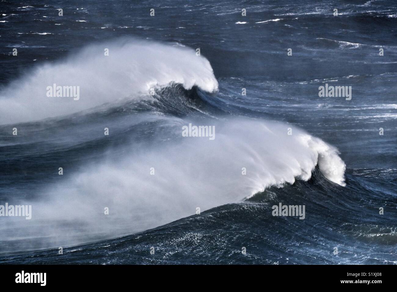 two consecutive waves in formation - Smartphone Captured Stock Image