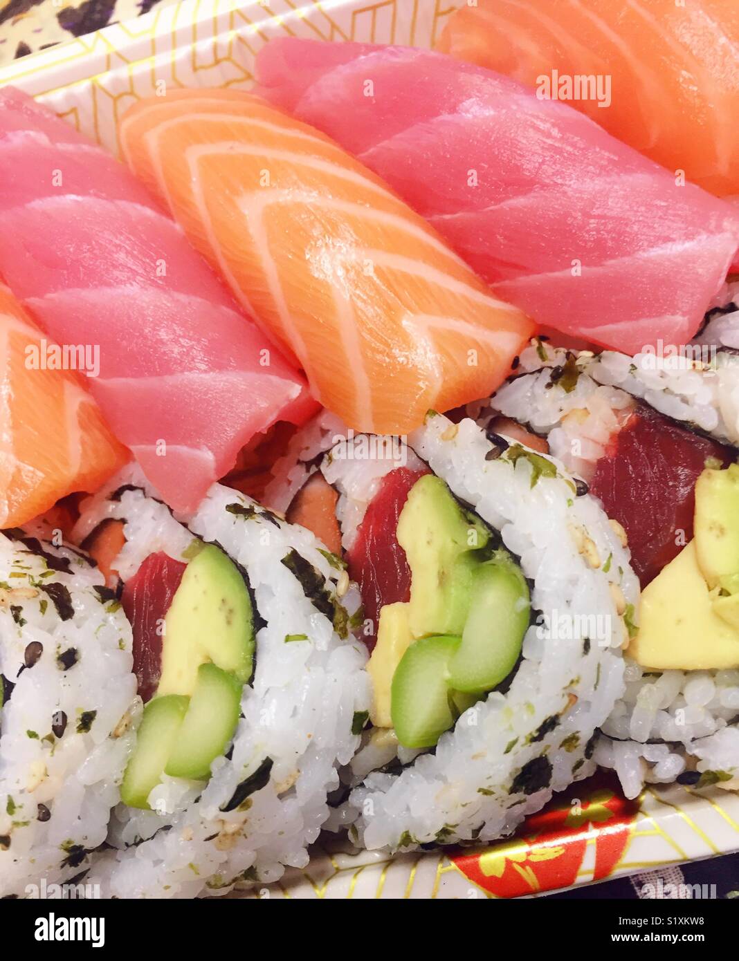 Fresh pieces of sushi in California roll from Japanese take out