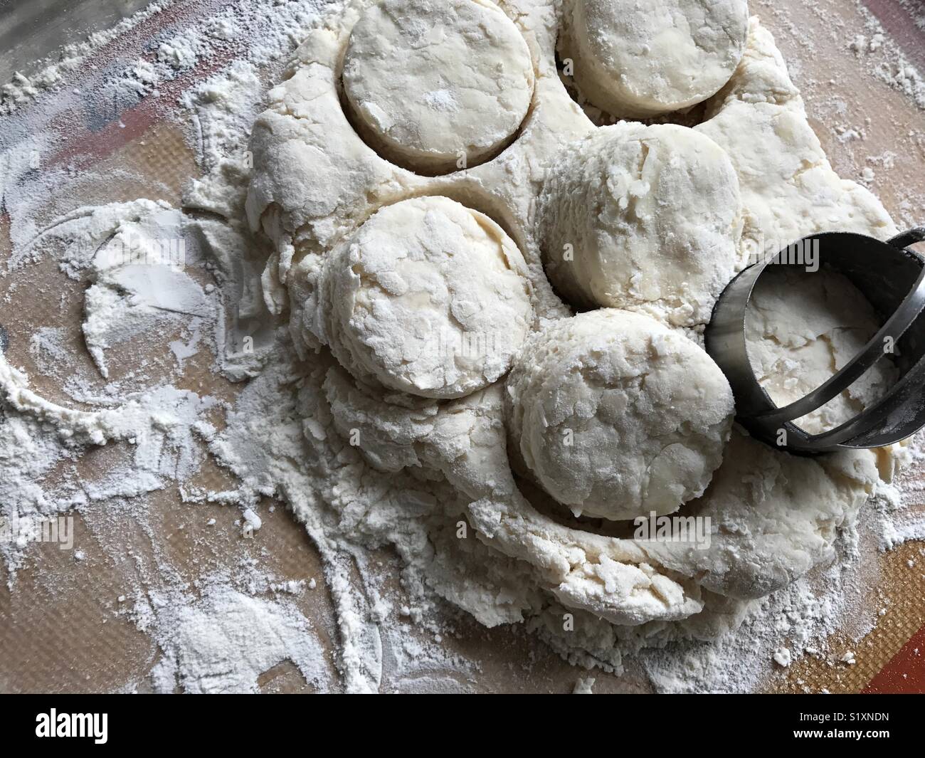 Cutting out biscuits - Smartphone Captured Stock Image
