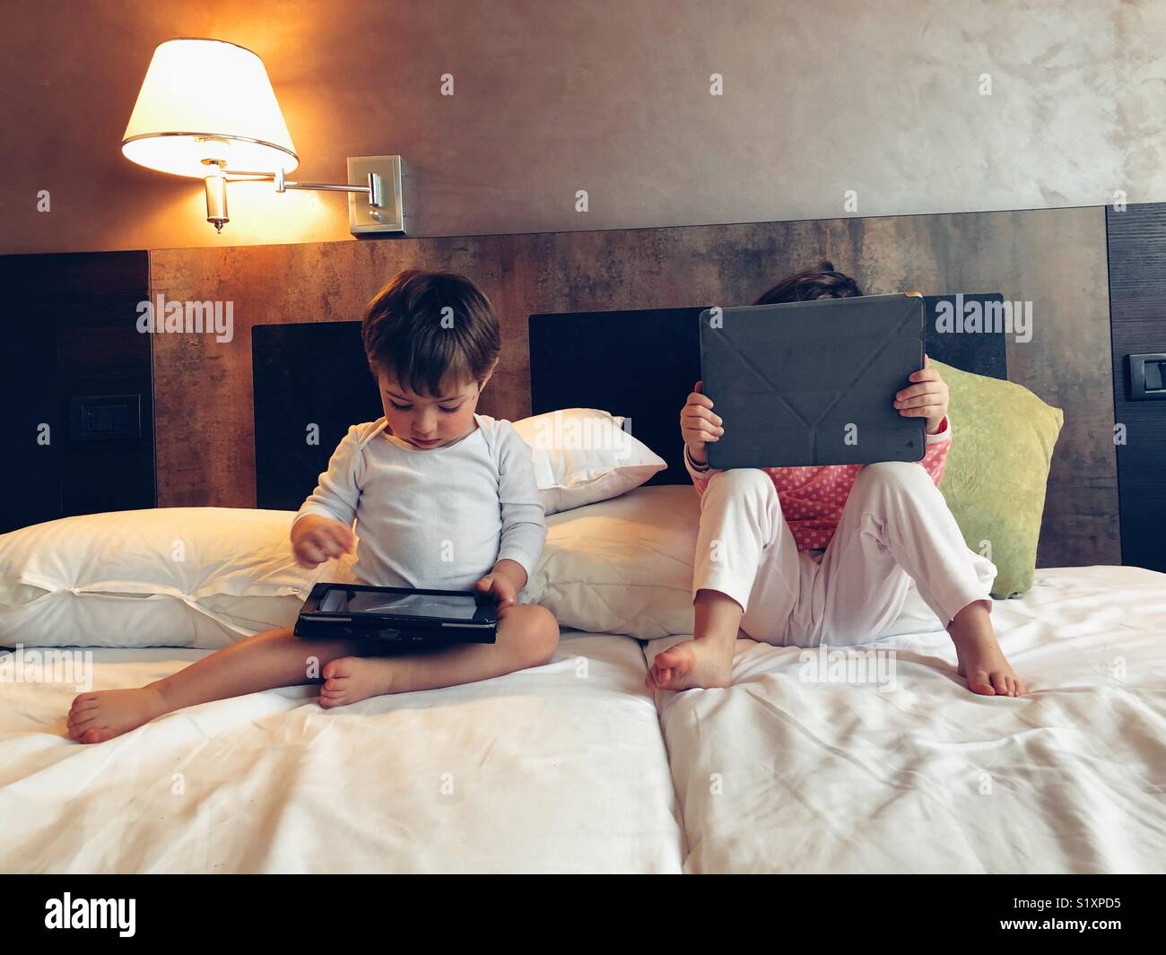 Children using digital tablet - Smartphone Captured Stock Image