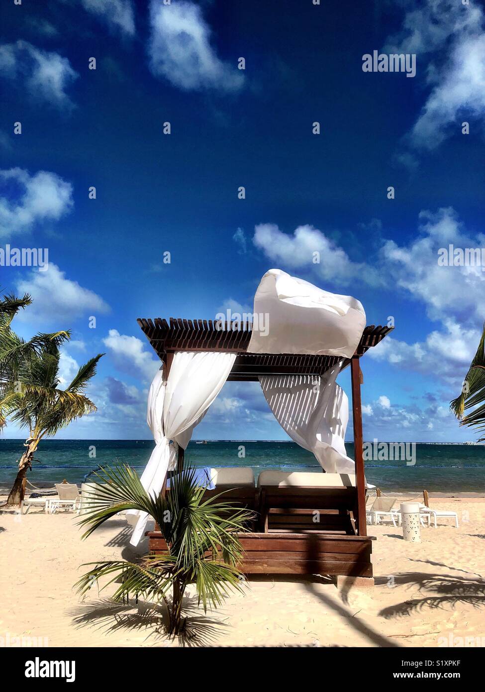 Ocean Front Cabana with White Curtains in Punta Cana, Dominican Republic - Smartphone Captured Stock Image