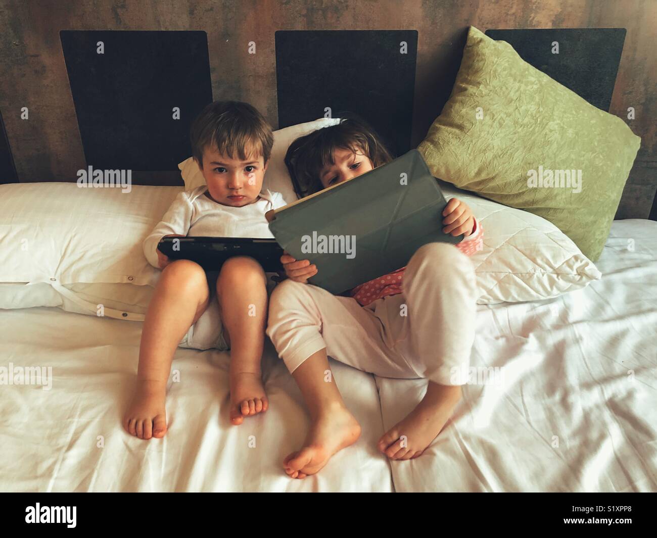 Children using a digital tablet - Smartphone Captured Stock Image