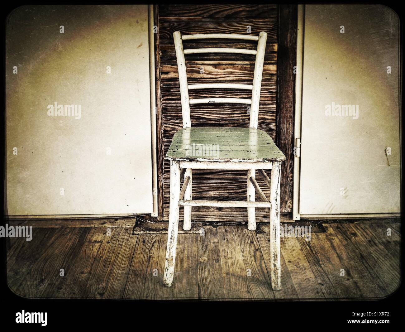 Old wooden chair on the porch Stock Photo - Alamy