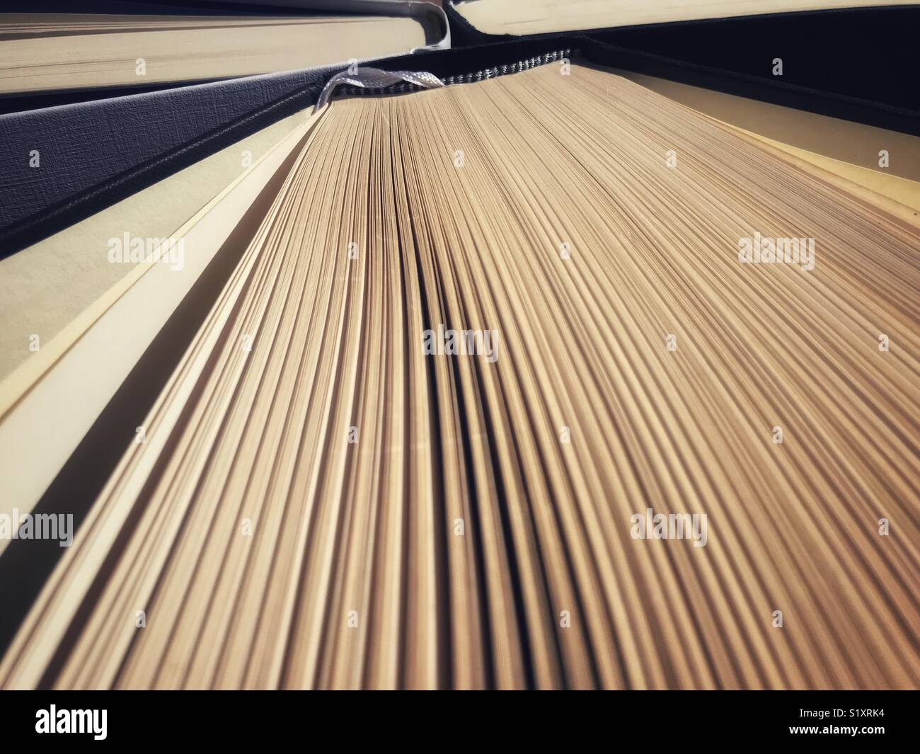 Hardback Book, pages fanned out - Smartphone Captured Stock Image