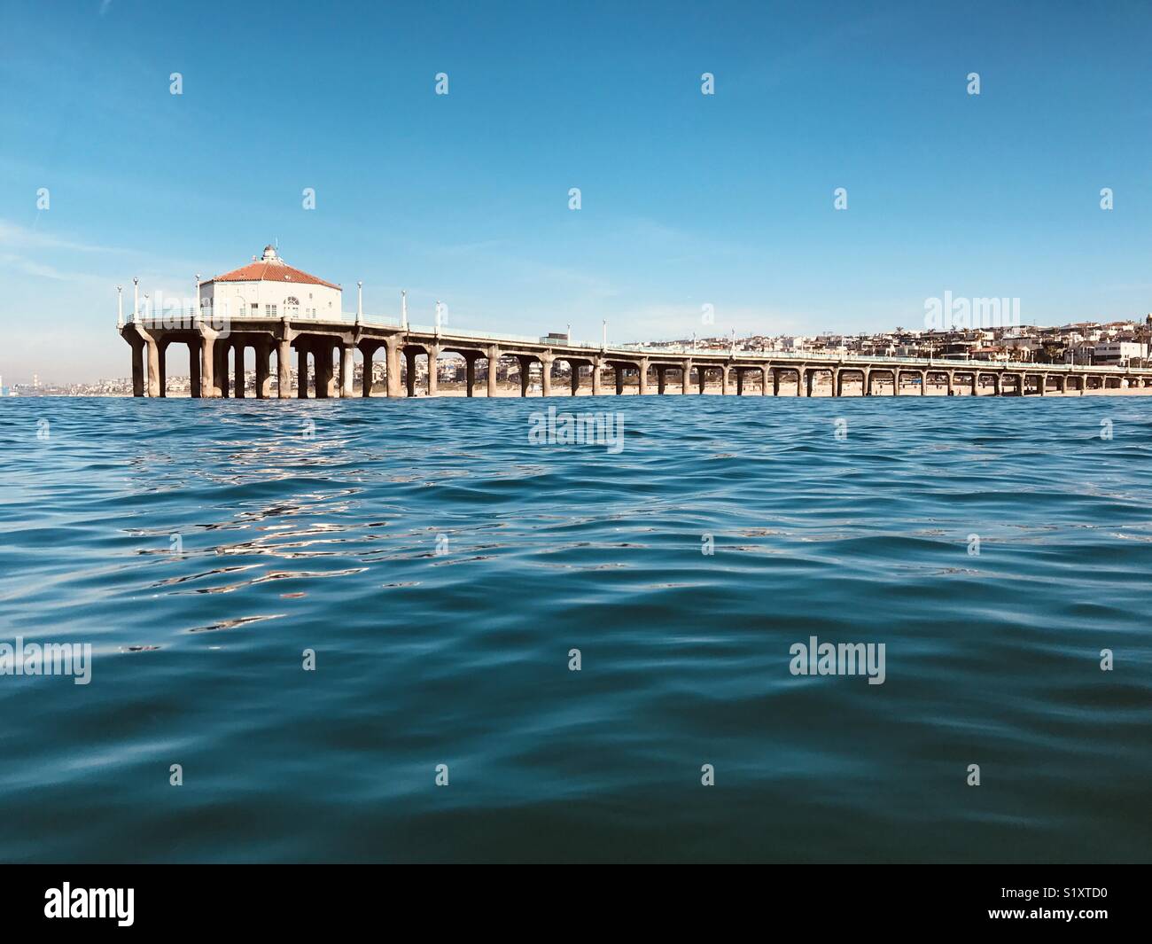 Manhattan Beach pier from the water. Manhattan Beach, California USA. Stock Photo