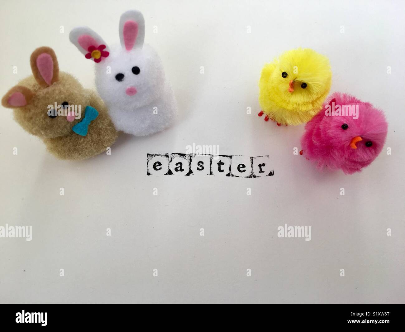 Springtime chicks and Easter bunnies around the word Easter - Smartphone Captured Stock Image