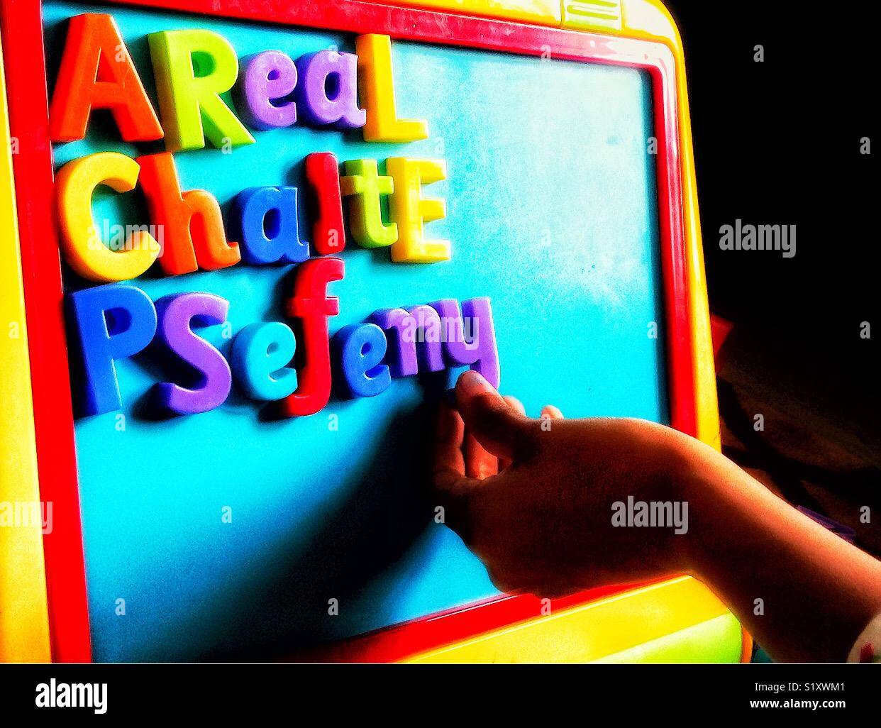 A child’s colourful spelling board. - Smartphone Captured Stock Image