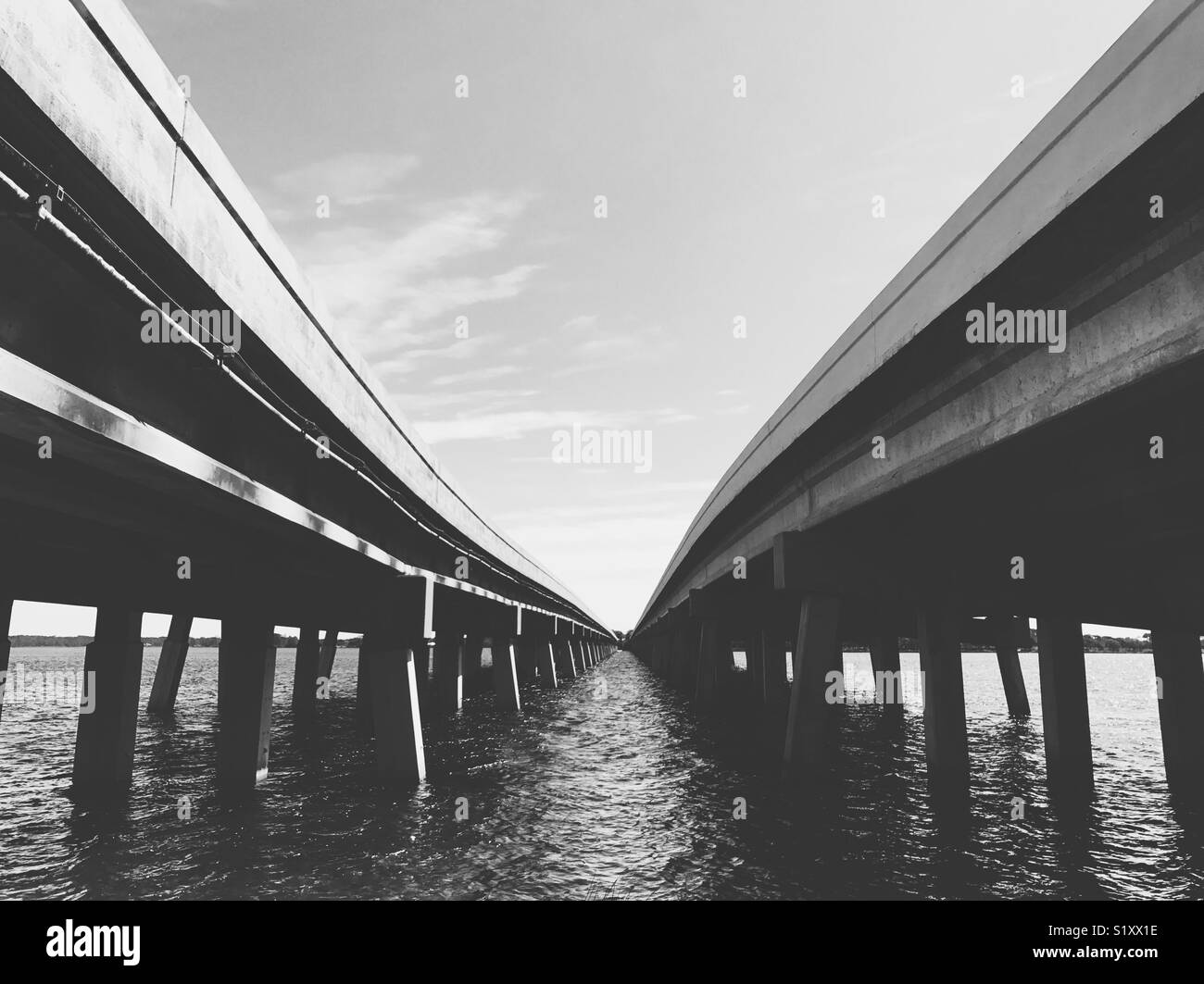 A highway in Florida crossing a coastal lake. - Smartphone Captured Stock Image