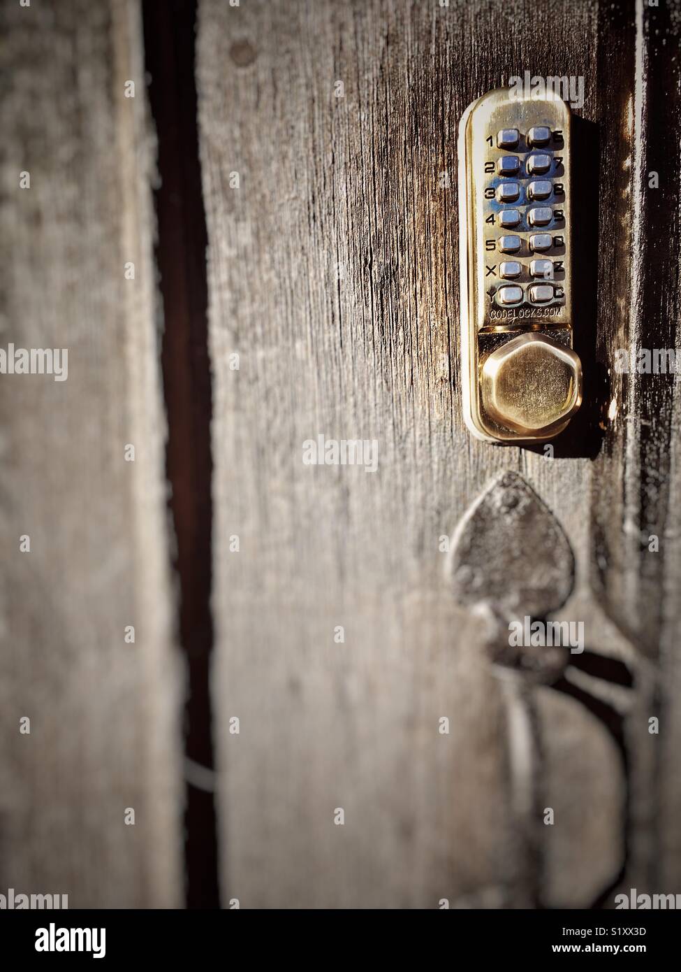 Combination lock on church door - Smartphone Captured Stock Image