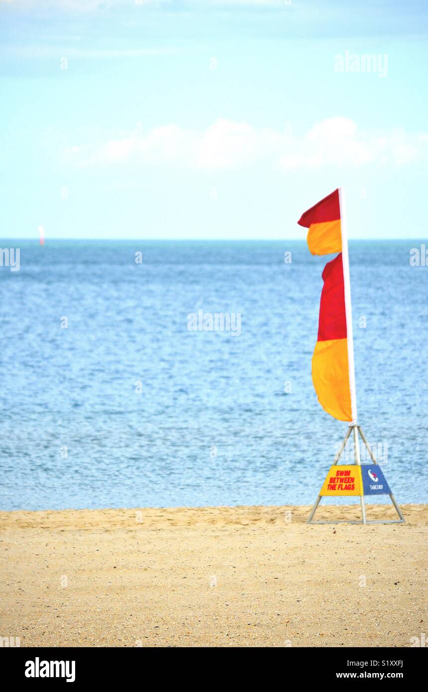 Flag on beach Stock Photo Alamy