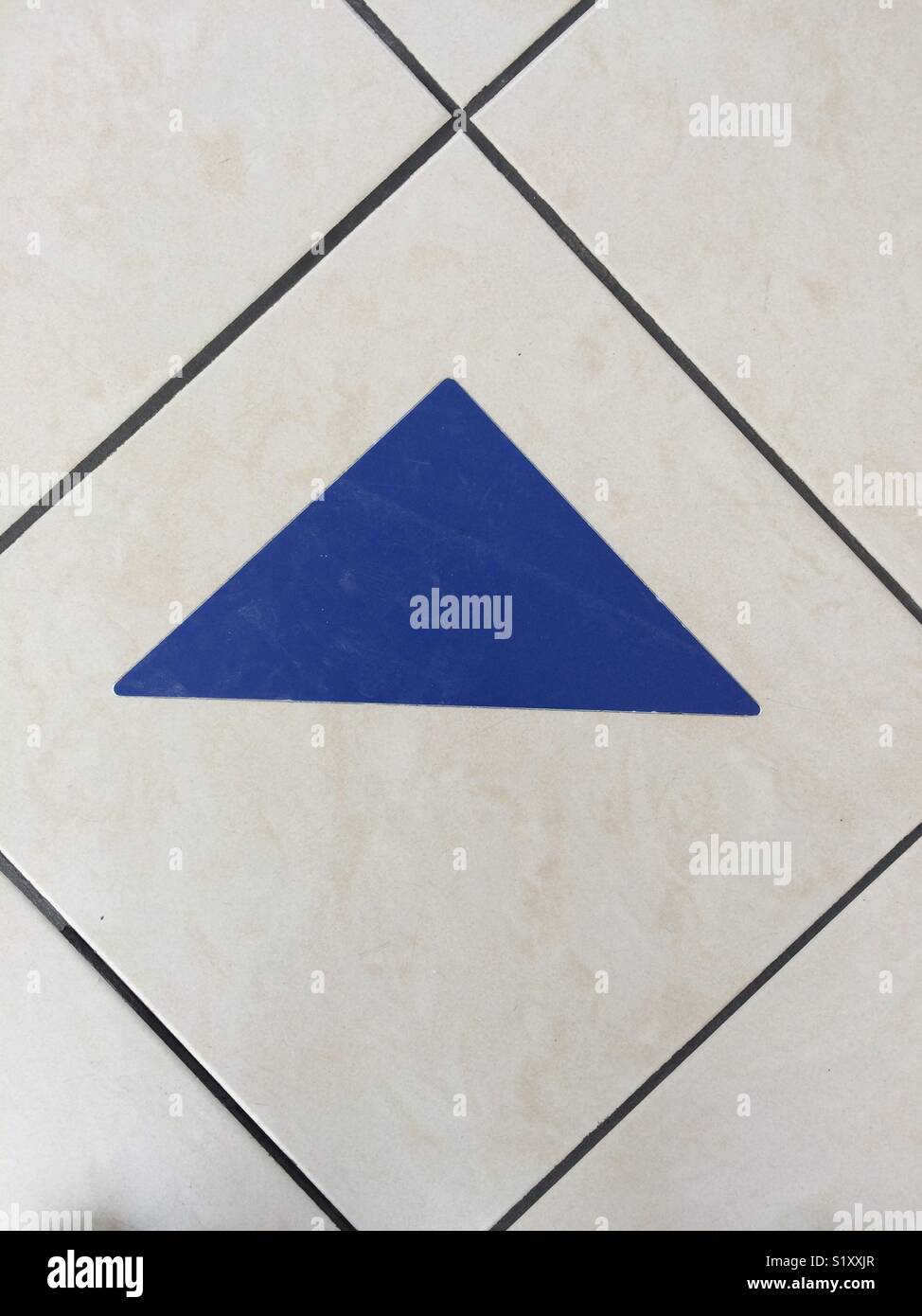 Arrow design in floor - Smartphone Captured Stock Image