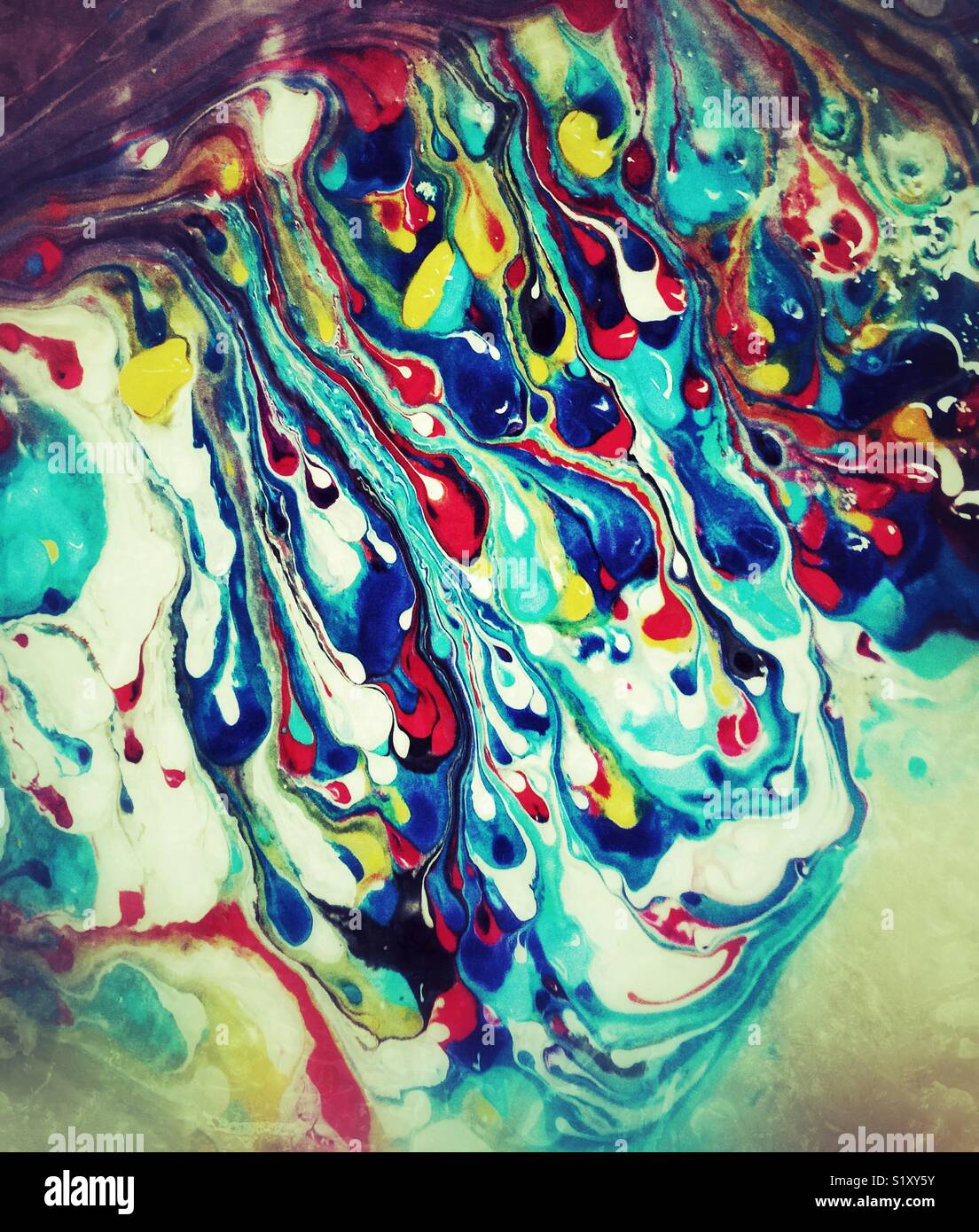 Marbling effect created by leftover paints Stock Photo