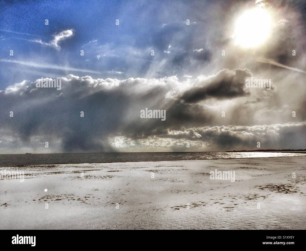 Snow covered beach, Shingle Street, Suffolk, UK. - Smartphone Captured Stock Image