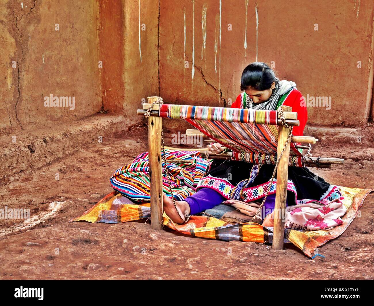Indigenous Woman Weaving in Cusco, Peru - Smartphone Captured Stock Image