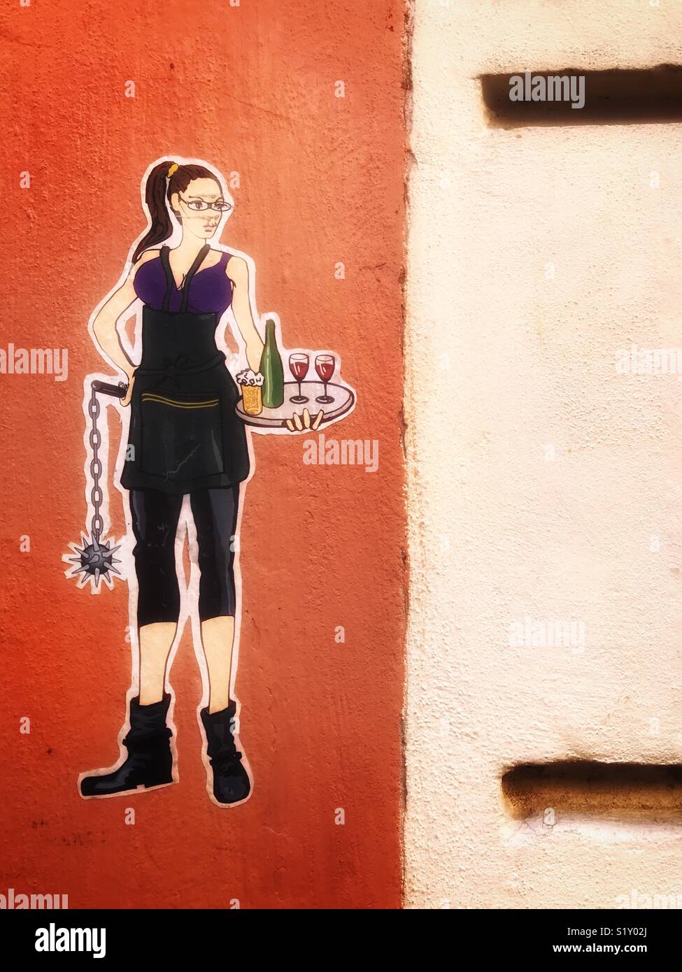 Sticker art showing a waitress carrying a tray with a bottle and two glasses of wine in one hand and a spiked ball and chain in the other Stock Photo